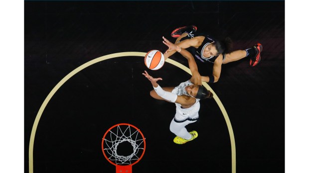 Golden State Valkyries' Janelle Salaün (13) fights for the ball against The Las Vegas Aces' A'ja Wilson (22) at the Chase Center in San Francisco on Aug. 6, 2025. (Shae Hammond/Bay Area News Group)