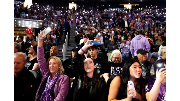 Fans turn on their phone lights during a break at a Golden State Valkyries game against The Las Vegas Aces at the Chase Center in San Francisco, Calif., on Wednesday, Aug. 6, 2025. (Shae Hammond/Bay Area News Group)