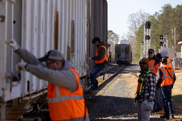 Workers practice safety skills at the Norfolk Southern Training Center in McDonough on Friday, March 7, 2025. (Arvin Temkar/AJC)
