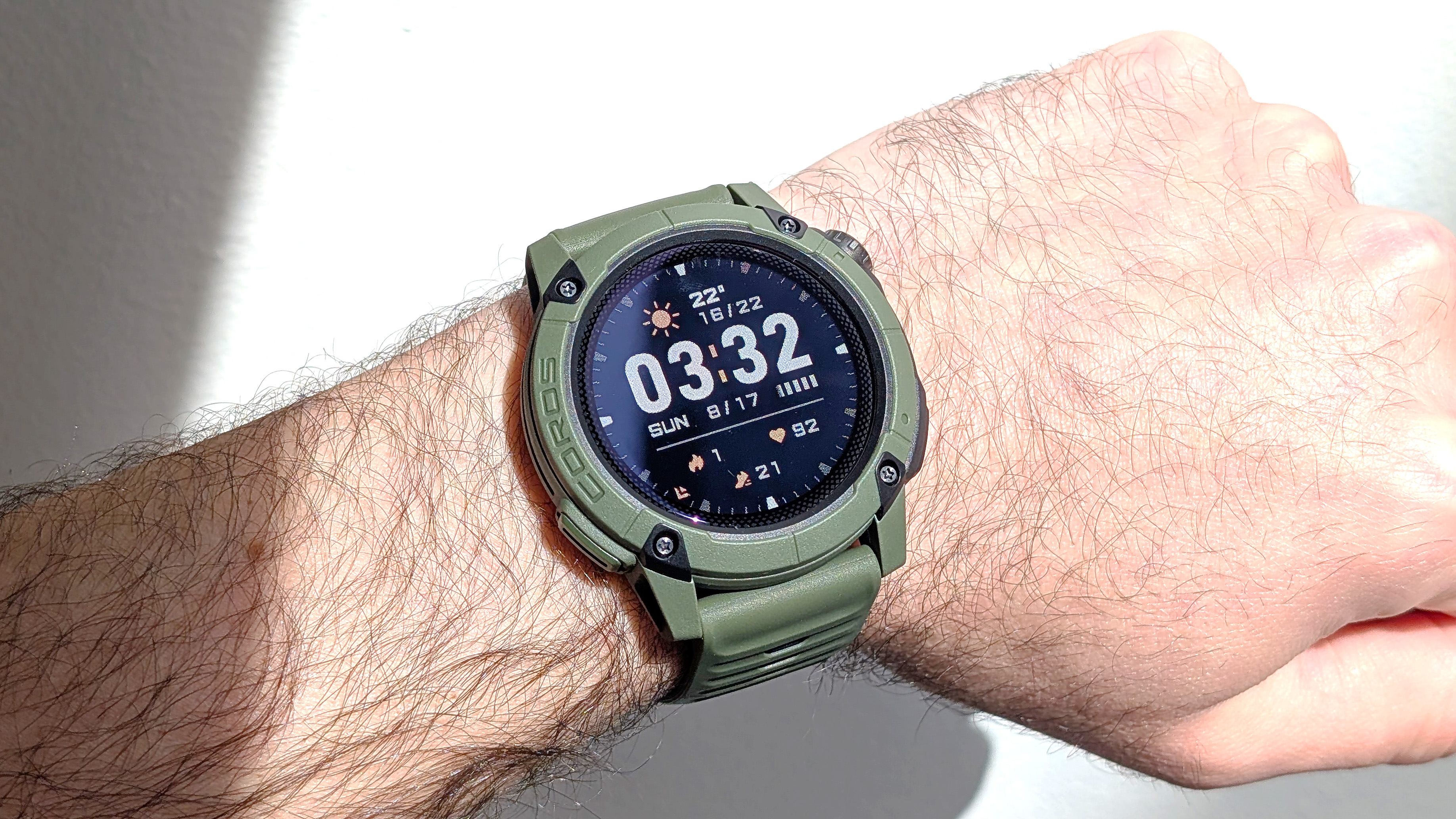 Close-up of the Coros Nomad rugged smartwatch in dark green