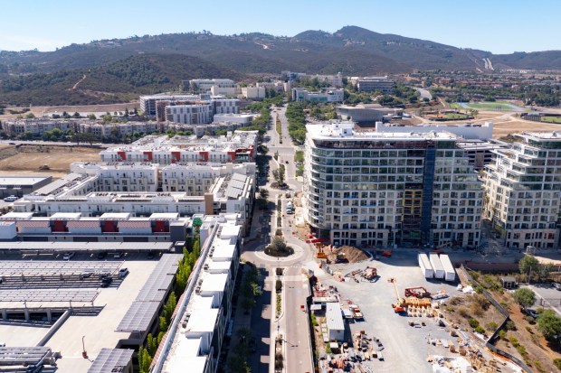Cal State San Marcos presence in San Marcos includes a major education center and student housing in the emerging North City housing, entertainment, and dining district in the lower half of this photo to the school's main campus across East Barham Drive. (Nelvin C. Cepeda / The San Diego Union-Tribune)