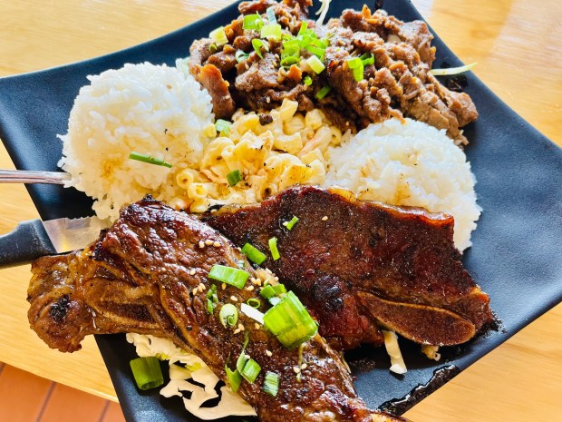 Dalu Hawaiian BBQ's two-item combo plate with teriyaki beef, short ribs, macaroni and cheese and steamed white rice. (Carlos Rico / The San Diego Union-Tribune)