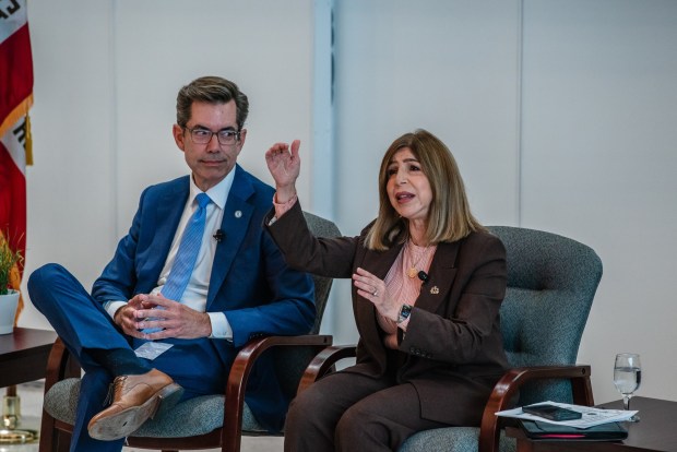 Councilmember Stephen Whitburn (left), and District Attorney Summer Stephan (right) speak during the "Interim Housing That Works: Policies, Models, and Momentum," at the Senator Blakespear's 3rd Annual Ending Street Homelessness Summit on Aug. 13, 2025 at the University of California San Diego in La Jolla, Calif. (Ariana Drehsler / For The San Diego Union-Tribune)