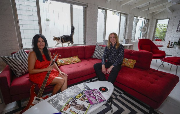 Mike and Anja Stax of the band The Loons are shown in their La Mesa home. They will perform Sunday at Tiki Oasis with Lenny Kaye and various guest artists. (Alejandro Tamayo / The San Diego Union-Tribune)
