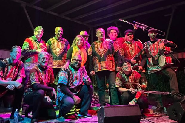 Percussionist Charlie Chavez, center, will perform at Quartyard with his dance-happy band Afrotruko. Their concert is a prelude to the 2025 San Diego Tijuana International Jazz Festival. (Courtesy Charlie Chavez)
