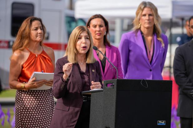 Summer Stephan, District Attorney, speaking at the podium. San Diego County commemorates International Overdose Awareness Day at the County Administration Center in Harborview on Thursday, Aug. 21, 2025 in San Diego, California. (Alejandro Tamayo / The San Diego Union-Tribune)