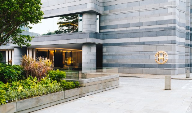 The exterior of The Upper House luxury hotel in Hong Kong, which will host an auction for a Coronado mansion in mid-Sept. (CoStar).