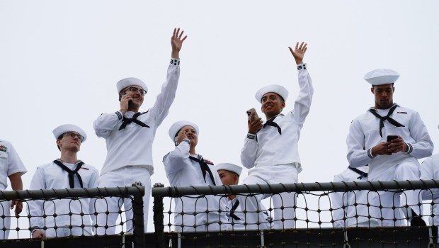 Sailors wave to family and friends as the Carl Vinson pulls into San Diego Bay. Sailors on board the USS Carl Vinson returned from deployment to their homeport at Naval Air Station North Island on Thursday, Aug. 14, 2025, in Coronado, CA. (Nelvin C. Cepeda / The San Diego Union-Tribune)
