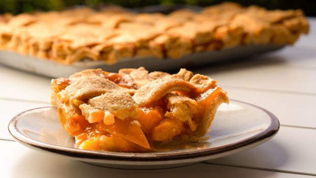 Emily Brubaker, resort executive chef at Omni La Costa in Carlsbad, prepared bourdon brown sugar peach slab pie, at the Vue, one of eight restraints she oversees at the resort. She won season 1 of the NBC culinary competition show, " Yes, Chef!" hosted by Martha Stewart and chef Jose Andres to take home the $250,000 prize. Photographed Thursday July 24, 2025, in Carlsbad, California. Howard Lipin / For The San Diego Union-Tribune)