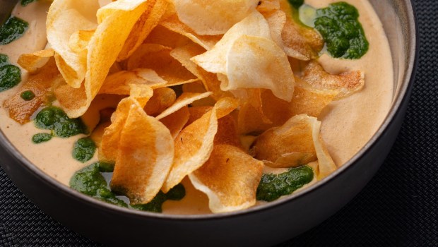 Emily Brubaker, resort executive chef at Omni La Costa in Carlsbad, prepared anchovy and white bean dip with potato chips, at the Vue, one of eight restraints she oversees at the resort. She won season 1 of the NBC culinary competition show, " Yes, Chef!" hosted by Martha Stewart and chef Jose Andres to take home the $250,000 prize. Photographed Thursday July 24, 2025, in Carlsbad, California. Howard Lipin / For The San Diego Union-Tribune)