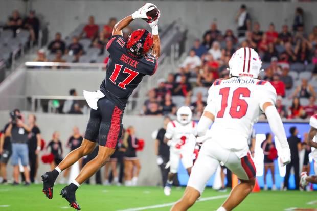 San Diego State wide receiver Jacob Bostick #17 of San Diego State pulls in a pass against Stony Brook during the first half at Snapdragon Stadium on Thursday, Aug. 28, 2025 in San Diego, CA. (Meg McLaughlin / The San Diego Union-Tribune)