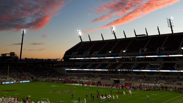 The sun sets behind San Diego State Aztecs' home opener against the Stony Brook Seawolves at Snapdragon Stadium on Thursday, Aug. 28, 2025 in San Diego, CA. (Meg McLaughlin / The San Diego Union-Tribune)