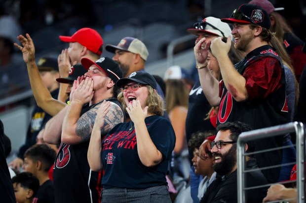 San Diego State Aztecs fans celebrate during the second half of their game against Stony Brook Seawolves at Snapdragon Stadium on Thursday, Aug. 28, 2025 in San Diego, CA. (Meg McLaughlin / The San Diego Union-Tribune)