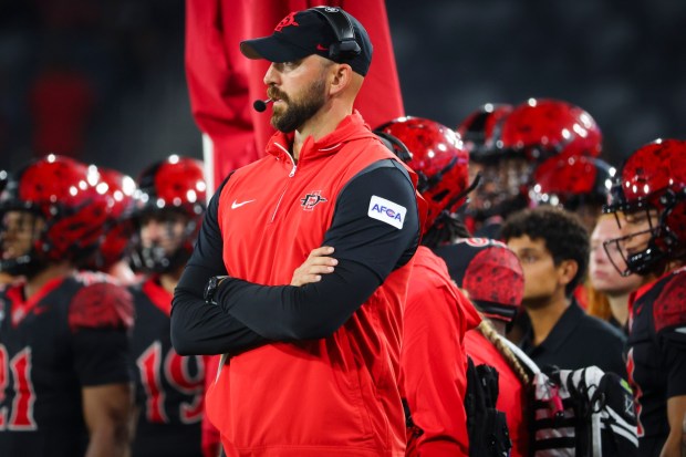 Head coach Sean Lewis of the San Diego State Aztecs looks on during the second half against the Stony Brook Seawolves at Snapdragon Stadium on Thursday, Aug. 28, 2025 in San Diego, CA. (Meg McLaughlin / The San Diego Union-Tribune)