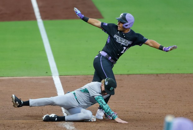 Trey Ebel of the West team is tagged out trying to steal third base by Brock Rein of the East team during the DICK'S Sporting Goods Perfect Game All-American Classic at Petco Park on Aug. 17, 2025 in San Diego, CA. (K.C. Alfred / The San Diego Union-Tribune)