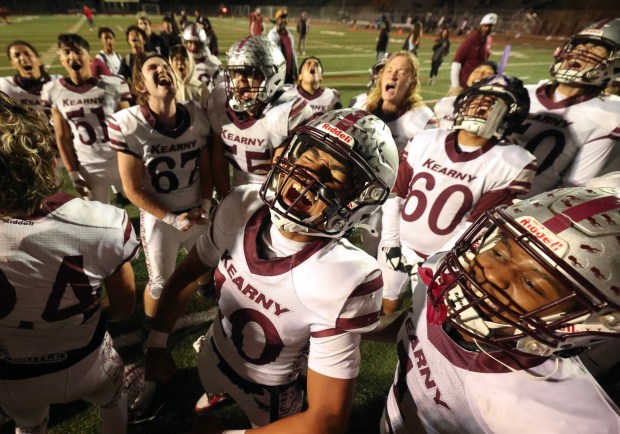 Kearny players celebrate their 56-41 win over Canyon Hills at Canyon Hills High School in San Diego on Friday, Nov. 01, 2024. (Hayne Palmour IV / For The San Diego Union-Tribune)