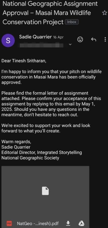 Screenshot of an email from Sadie Quarrier of National Geographic, approving Tinesh Sritharan’s proposal on wildlife conservation in Masai Mara, with a request to confirm acceptance and attached assignment letter PDF.