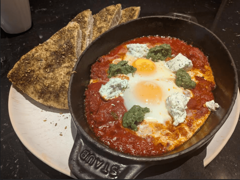 Shakshuka and pita. Photo by Andrew Davis