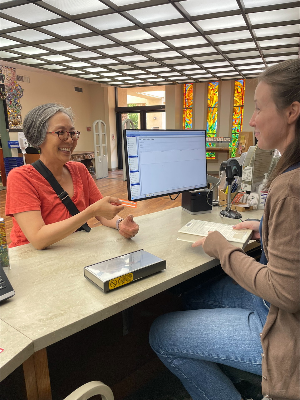 Photo Courtesy of South Pasadena Public Library | The South Pasadenan | Public Services Manager Maida Wong provides assistance at South Pasadena Library. Wong is retiring after working at the library over the past 37 years.