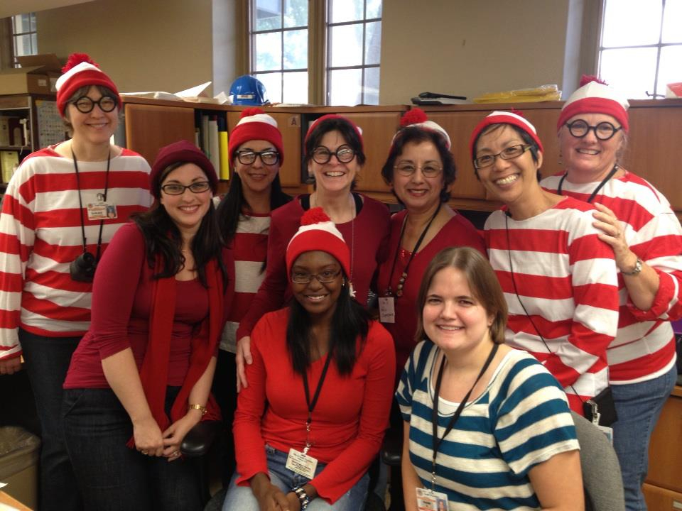 Photo Courtesy of South Pasadena Public Library | The South Pasadenan | Maida Wong, back row, second from right, joined South Pasadena Public Library staff in dressing up in Where’s Waldo Costumes. The children’s puzzle books were created by English illustrator Martin Hanford.