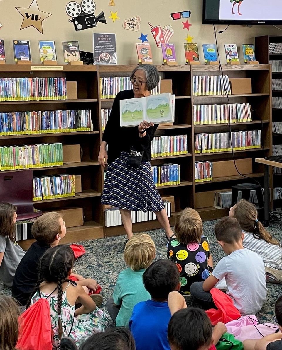 Photo Courtesy of South Pasadena Public Library | The South Pasadenan | South Pasadena Library Public Service Manager Maida Wong reads to a group of students from Marengo Elemenary School.