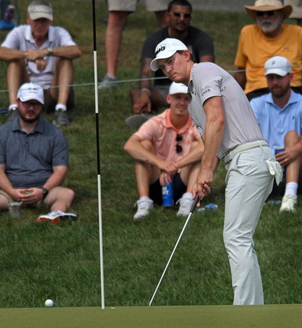 Maverick McNealy putts on the ninth hole during the third...