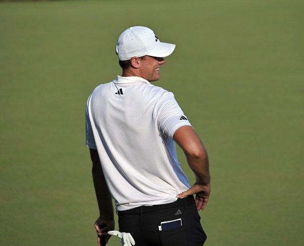 Ludvig Aberg relaxes after birdieing on the 18th to finish...
