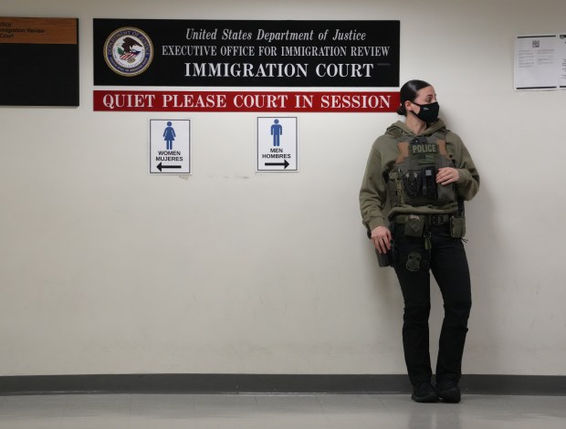 Federal law enforcement officers are pictured in the hallway outside immigration court at 26 Federal Plaza Tuesday, June 10, 2025 in the Manhattan, New York. (Barry Williams/ New York Daily News)
