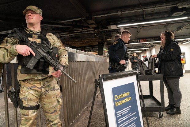 A member of the New York National Guard stands post as MTA police conduct bag checks at Grand Central Terminal Wednesday, March 6, 2024 in Manhattan, New York. (Barry Williams for New York Daily News)