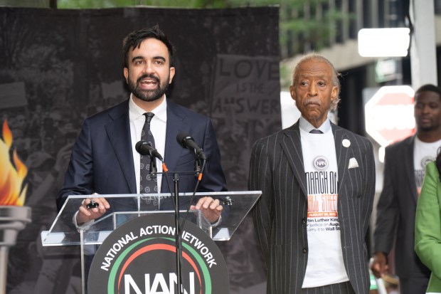 Zohran Mamdani, left, and Rev. Al Sharpton are pictured after a "March on Wall Street" to call for economic justice on August 28, 2025, in New York City. (Theodore Parisienne / New York Daily News)