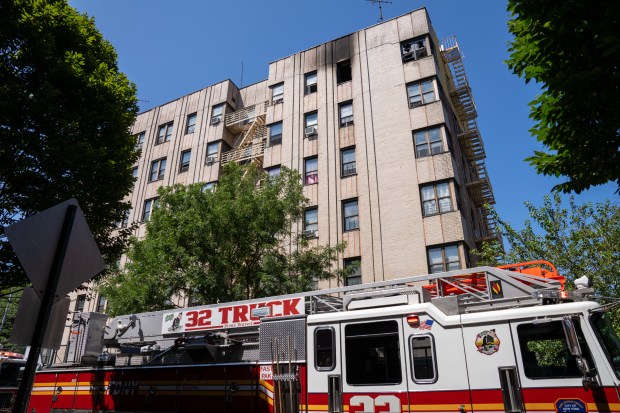 A man was found unconscious and unresponsive after a two-alarm fire inside a top-floor apartment at 2260 Bronx Park East in the Bronx on Friday, Aug. 8, 2025. (Theodore Parisienne / New York Daily News)