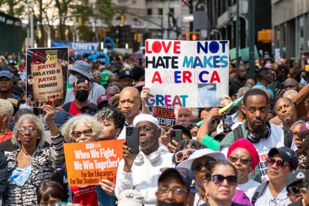 People participate in a "March on Wall Street" to call for economic justice on August 28, 2025, in New York City. (Theodore Parisienne / New York Daily News)