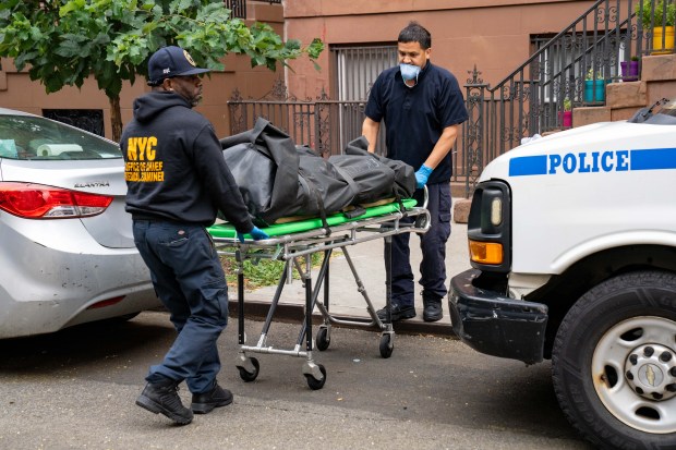 A 34-year-old man was pronounced dead on scene after he was found stabbed multiple times in the legs inside a fourth-floor apartment at 250 W. 138th St. in Manhattan on Friday, Aug. 1, 2025. (Theodore Parisienne / New York Daily News)