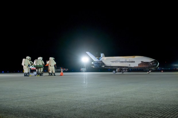 The Boeing-built X-37B spaceplane lands at Vandenberg Space Force Base to complete its seventh mission on March 7, 2025. A second version of the X-37B is slated to launch for its eight mission from Kennedy Space Center on Thursday night. (Courtesy/U.S. Space Force)