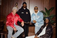 NFL players Christian McCaffrey, Amon-Ra St. Brown, CeeDee Lamb and Tee Higgins pose for...