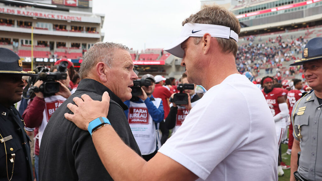 Ole Miss head coach Lane Kiffin and Arkansas head coach Sam Pittman. Mandatory credit: Nelson Chenault-Imagn Images