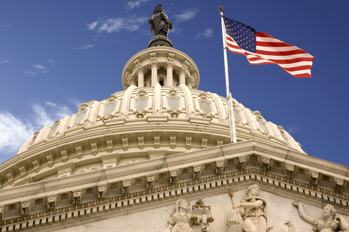 U.S. capitol dome and flag