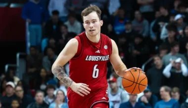 2-time NCAA champion coach says he'd return to Louisville 'in a New York minute' despite scandal image