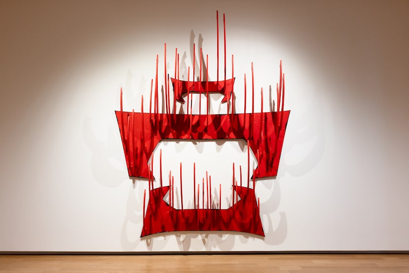 The paintings shift from pure black to exuding strings of vivid color derived from different...