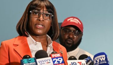 From left, Celena Morrison-McLean and Darius McLean hold a news conference on Thursday, March 7, 2024 in Philadelphia. The Philadelphia city official was arrested over the weekend during a traffic stop and started recording the incident because she feared for her husband's life as a trooper handcuffed him on a rainy elevated highway. (Tom Gralish/The Philadelphia Inquirer via AP)