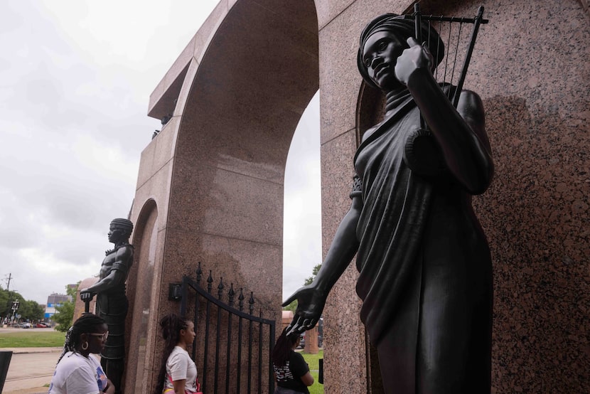 The “Sentinel” and “Prophetess” sculptures by David Newton greet visitors at the entrance of...