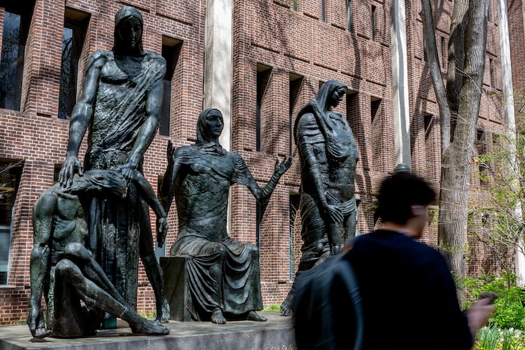 A pedestrian on the University of Pennsylvania's campus in April. Universities are in a moment of extreme politicization, but that politicization harms some parts of the academy more than others, Jessa Lingel writes.