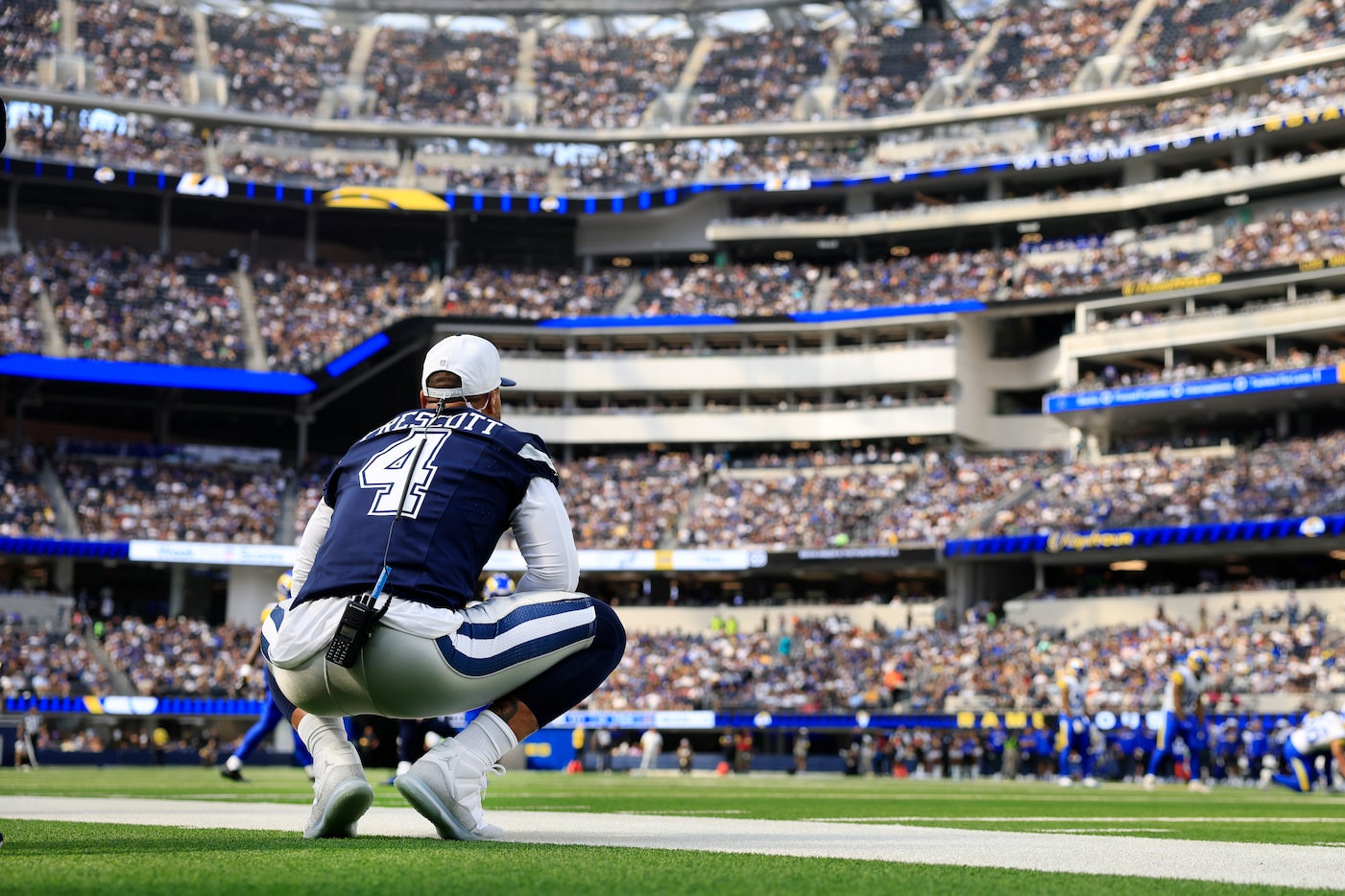 Dallas Cowboys quarterback Dak Prescott (4) watches from the sideline as the team faces the...