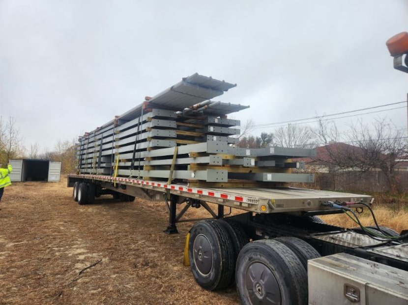 This image shows metal building materials the church was planning to use to construct a new...