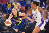 Dallas Wings guard Paige Bueckers (5) drives against Los Angeles Sparks forward Azura...