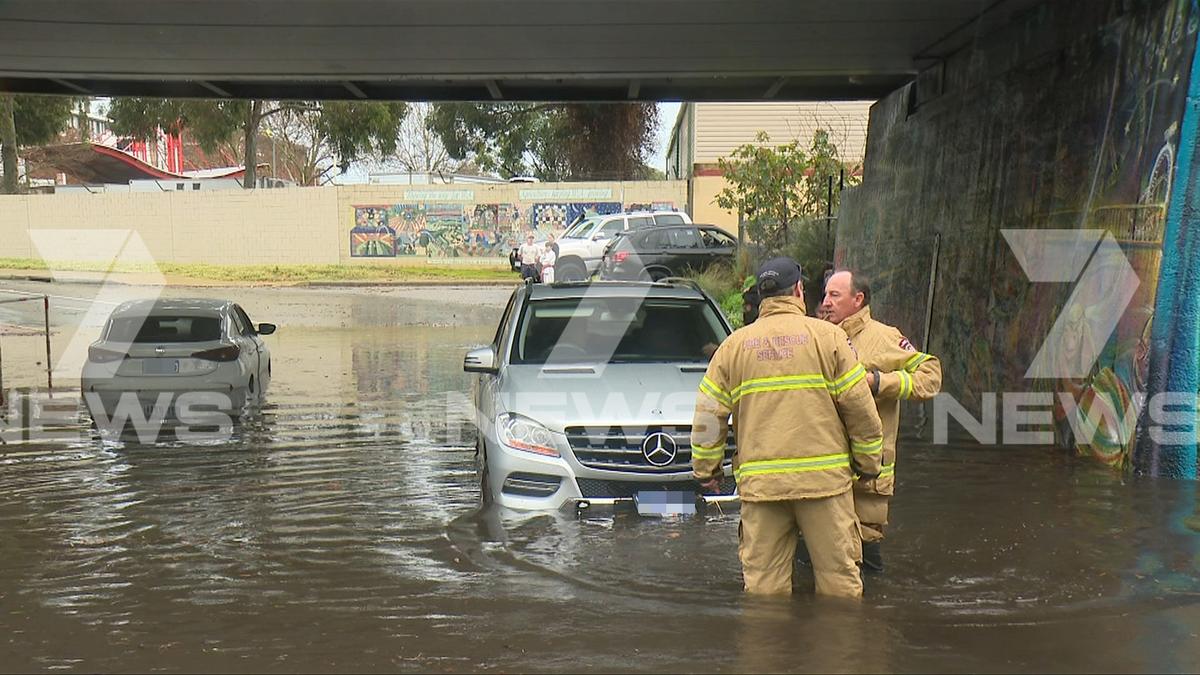 Perth weather: Floodwaters trapped people inside cars and homes on Saturday morning