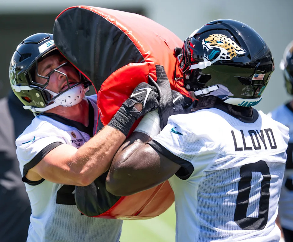 Jacksonville Jaguars linebacker Chad Muma (48) makes a run Jacksonville Jaguars linebacker Devin Lloyd (0) during the fourth organized team activity at the Miller Electric Center in Jacksonville, Fla. Tuesday, May 27, 2025. [Doug Engle/Florida Times-Union]