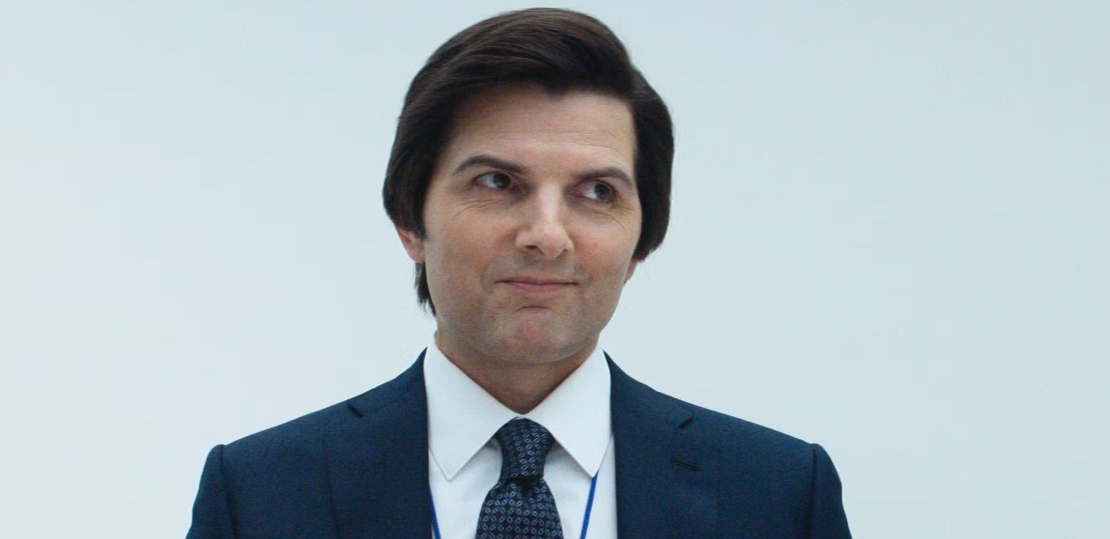 Adam Scott smiling in Severance