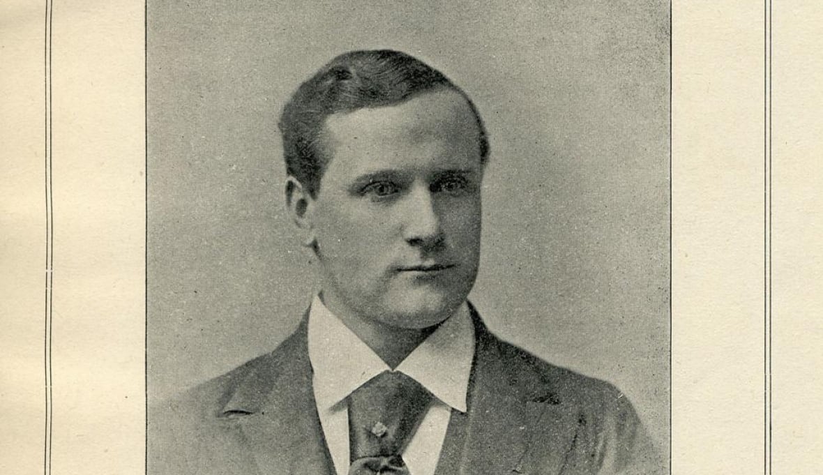 A black and white photo of a man 