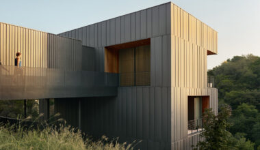 alterstudio's falcon ledge residence climbs steep ravine in austin